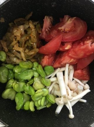 First release of pickled mustard white jade mushrooms tomato and broad bean paste soup