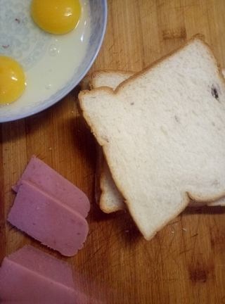 Exclusive Egg and Ham Sausage Sandwich