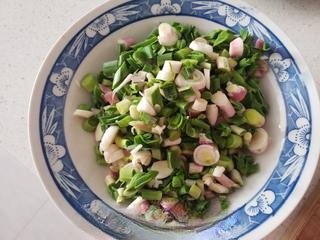 Stir-fried rice with garlic sprouts, eggs, and ham sausage