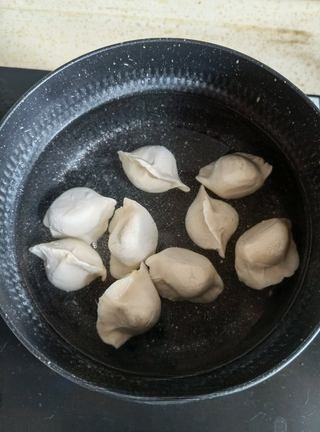 Exclusive Qinghong Soup Dumplings