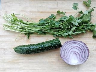 Cucumber and onion mixed with cilantro