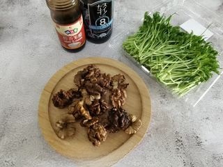 Brain-boosting and healthy food: pea shoots mixed with walnuts