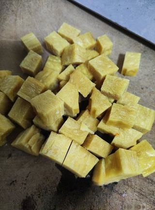 Yellow rice cake with poached egg cooked in fermented rice, exclusive