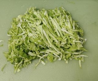 Stir-fried cabbage and shredded carrots