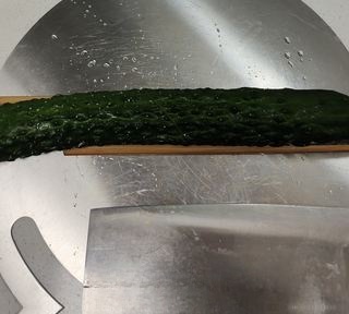 Straw raincoat cucumber